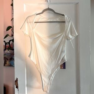L white body suit